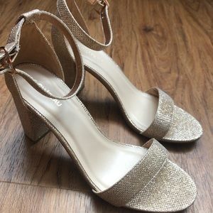 Le Chateau heels, size 8.5, in “Champagne”.
